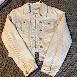 Size Medium Light Wash Jean Jacket.
